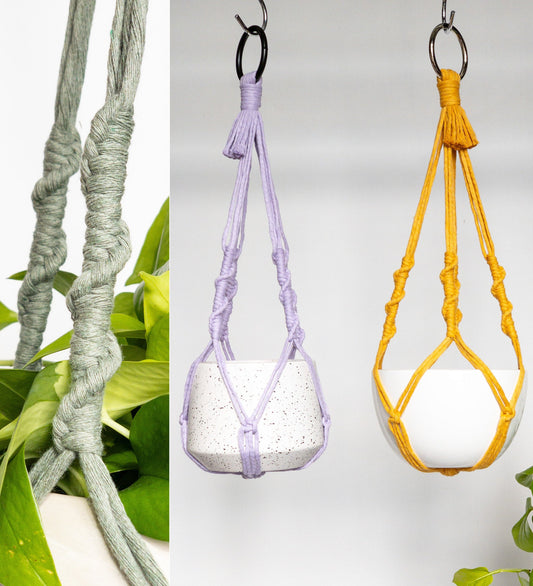 Two macrame plant hangers. They do not have a tail, but instead have a tassel at the top hanging from the metal ring. They feature corkscrew spiral decorative section that starts at the top of the pot and goes through the middle of the plant hanger